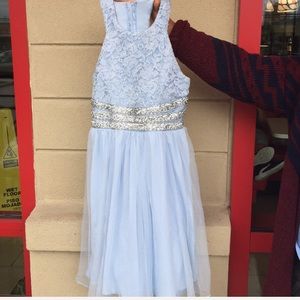I am selling a sky blue rhinestoned kids dress